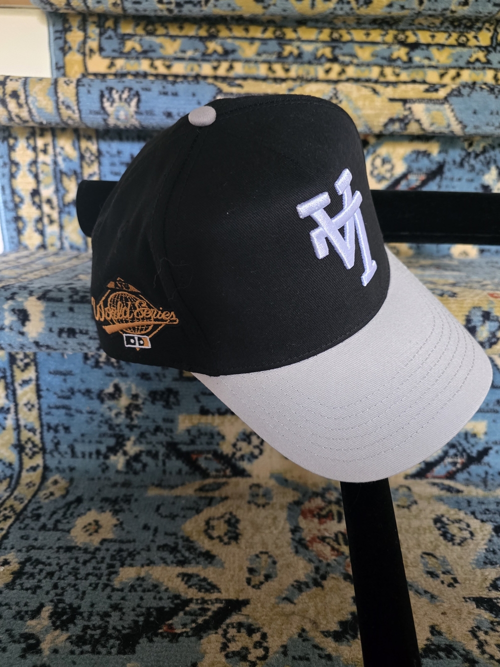 Black and Light Gray Baseball Cap with White Raised Logo